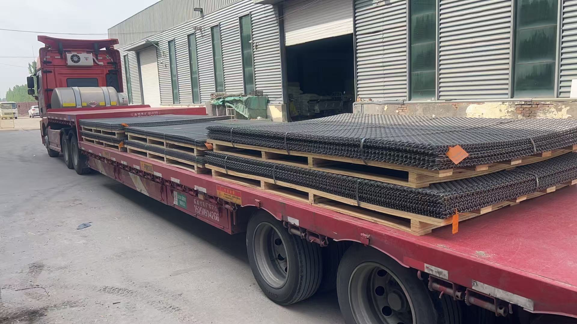 Woven screen panels loaded for transport